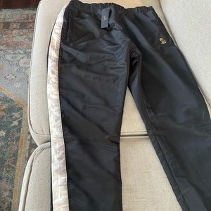 OVO satin sweat pants with snap buttons on the side